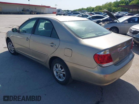 2006 Toyota Camry STD with VIN 4T1BE30K76U704819, listed as a IAAI auction lot 42021982 with 264,934 mi miles and . Bid and sale history available at carsss.com. Image 3.