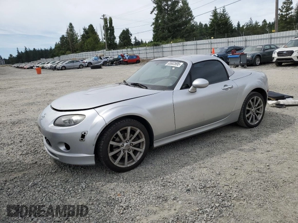 2008 Mazda MX-5 Miata Touring with VIN JM1NC26F780146072, listed as a Copart auction lot 65602695 with 124,607 mi miles and Salvage title. Bid and sale history available at DreamBid. Image 1.