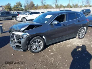 2022 BMW X2 xDrive28i z VIN WBXYJ1C05N5U40472, wystawiony jako IAAI lot #41433452 z przebiegiem 67 801 mil mil oraz . Historia ofert i sprzedaży dostępna na DreamBid. Obrazek 16.