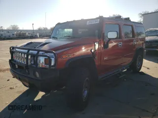 2004 Hummer H2 with VIN 5GRGN23U24H101928, listed as a Copart auction lot 86820104 with 197,079 mi miles and Salvage Title. Bid and sale history available at carsss.com. Image 1.