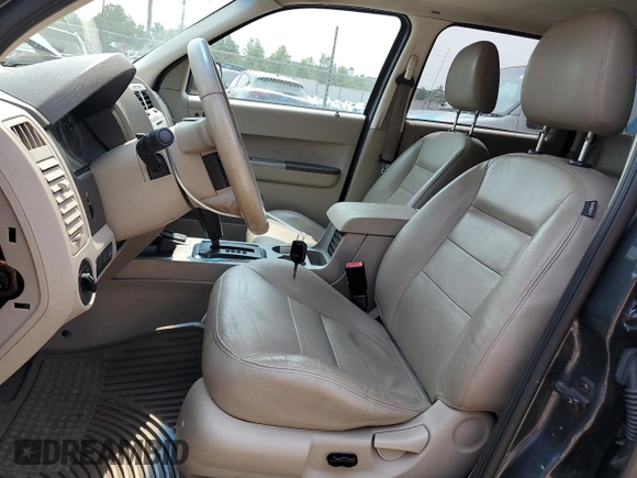 2008 Ford Escape Hybrid z VIN 1FMCU49H38KA03178, wystawiony jako Copart lot #59577115 z przebiegiem 223 992 mil mil oraz Szkoda całkowita • Salvage title. Historia ofert i sprzedaży dostępna na DreamBid. Obrazek 7.