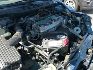 2001 Honda Accord LX with VIN JHMCG665X1C004411, listed as a IAAI auction lot 42653879 with 200,554 mi miles and . Bid and sale history available at DreamBid. Image 19.