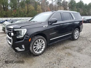 2023 GMC Yukon SLT with VIN 1GKS2BKD7PR122685, listed as a Copart auction lot 84611444 with 52,271 mi miles and Salvage Title. Bid and sale history available at carsss.com. Image 1.