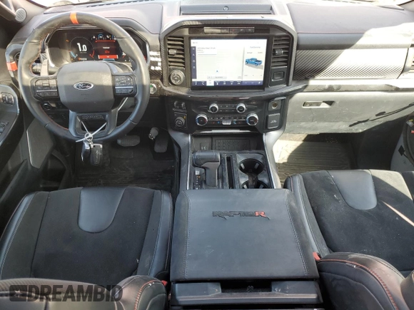 2023 Ford F-150 Raptor with VIN 1FTFW1RJ7PFA73609, listed as a Copart auction lot 45202695 with 22,974 mi miles and Salvage Title. Bid and sale history available at DreamBid. Image 8.