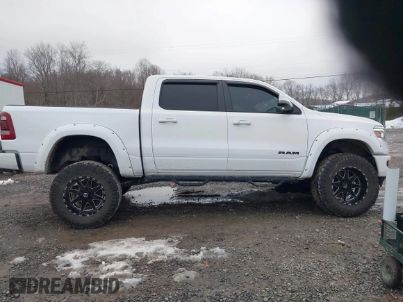2023 Ram 1500 Laramie with VIN 1C6SRFJT3PN519364, listed as a IAAI auction lot 41553431 with 23,541 mi miles and . Bid and sale history available at DreamBid. Image 13.