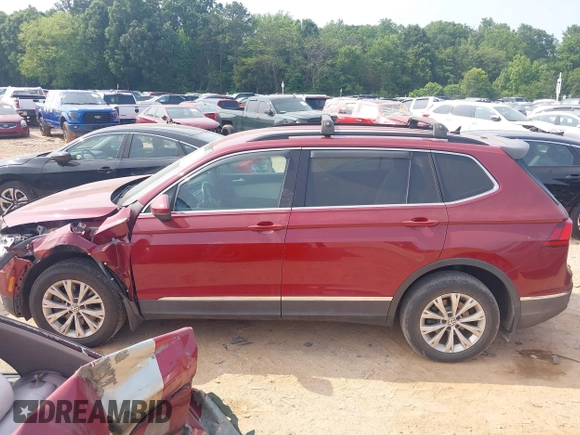 2018 Volkswagen Tiguan SEL with VIN 3VV3B7AX9JM054814, listed as a IAAI auction lot 42394400 with 92,160 mi miles and . Bid and sale history available at DreamBid. Image 14.