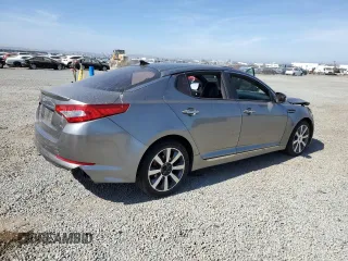 2013 Kia Optima SX с VIN 5XXGR4A63DG152535, выставлен на аукционе Copart как лот 63614895 с пробегом 172 394 миль миль и Списание • Salvage title. История ставок и продаж доступна на DreamBid. Изображение 3.