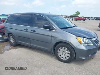 2009 Honda Odyssey LX with VIN 5FNRL38239B034888, listed as a IAAI auction lot 42448909 with 190,845 mi miles and . Bid and sale history available at DreamBid. Image 1.