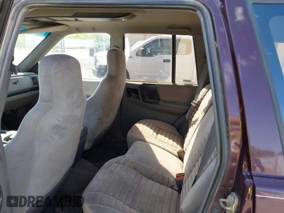 1994 Jeep Grand Cherokee Laredo with VIN 1J4GZ58Y2RC112641, listed as a IAAI auction lot 42212705 with 160,762 mi miles and . Bid and sale history available at DreamBid. Image 8.