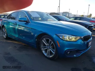 2019 BMW 4 Series 430i with VIN WBA4J1C54KBM15516, listed as a IAAI auction lot 41329118 with 50,689 mi miles. Bid and sale history available at carsss.com. Image 6.