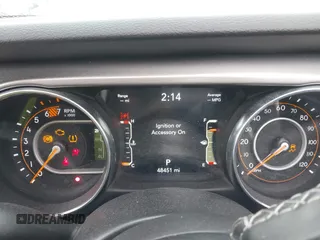 2023 Jeep Wrangler Willys with VIN 1C4HJXDN1PW596046, listed as a IAAI auction lot 41580875 with 48,451 mi miles and . Bid and sale history available at DreamBid. Image 7.