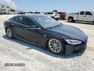 2017 Tesla Model S 100D z VIN 5YJSA1E21HF209847, wystawiony jako Copart lot #61848255 z przebiegiem 140 807 mil mil oraz Szkoda całkowita • Salvage title. Historia ofert i sprzedaży dostępna na DreamBid. Obrazek 4.