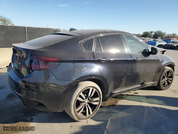 2012 BMW X6 M with VIN 5YMGZ0C59CLK14863, listed as a Copart auction lot 87869855 with 0 mi miles and Salvage Title. Bid and sale history available at carsss.com. Image 3.