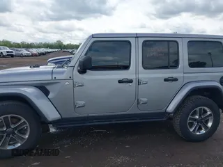 2019 Jeep Wrangler Unlimited Sahara with VIN 1C4HJXEN5KW542403, listed as a IAAI auction lot 42159197 with 60,378 mi miles and . Bid and sale history available at DreamBid. Image 14.