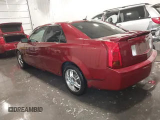 2006 Cadillac CTS with VIN 1G6DM57T560167128, listed as a IAAI auction lot 41911884 with 129,678 mi miles. Bid and sale history available at carsss.com. Image 3.