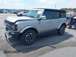2023 Ford Bronco z VIN 1FMEE5DPXPLB06603, wystawiony jako IAAI lot #42183408 z przebiegiem 22 272 mil mil oraz . Historia ofert i sprzedaży dostępna na DreamBid. Obrazek 18.