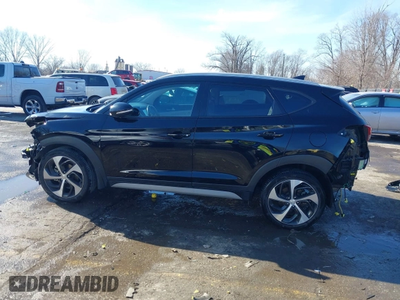 2018 Hyundai Tucson Sport with VIN KM8J33ALXJU771481, listed as a IAAI auction lot 41399335 with 64,905 mi miles. Bid and sale history available at carsss.com. Image 15.