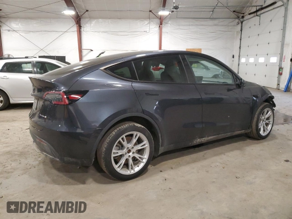 2024 Tesla Model Y Long Range with VIN 7SAYGDEE5RA237687, listed as a Copart auction lot 48366825 with 24,650 mi miles and Salvage Title. Bid and sale history available at DreamBid. Image 3.