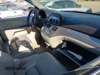 2008 Honda Odyssey EX-L with VIN 5FNRL38718B053448, listed as a IAAI auction lot 40182359 with 164,902 mi miles and . Bid and sale history available at DreamBid. Image 5.