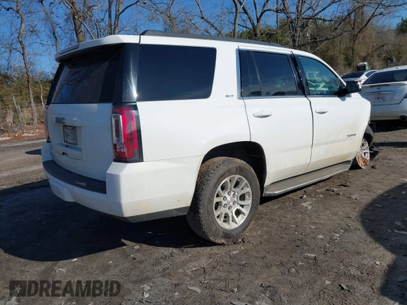 2019 GMC Yukon SLT with VIN 1GKS2BKC9KR166896, listed as a IAAI auction lot 41429865 with 165,174 mi miles. Bid and sale history available at carsss.com. Image 4.