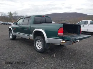 2001 Dodge Dakota Sport with VIN 1B7HG2AN91S279538, listed as a IAAI auction lot 41925891 with 113,368 mi miles and . Bid and sale history available at DreamBid. Image 3.