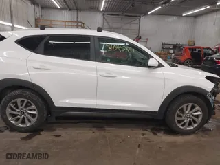 2016 Hyundai Tucson SE with VIN KM8J33A48GU117807, listed as a IAAI auction lot 41642891 with 142,371 mi miles. Bid and sale history available at carsss.com. Image 14.