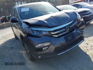 2016 Honda Pilot Elite with VIN 5FNYF6H01GB050555, listed as a IAAI auction lot 41670197 with 140,000 mi miles. Bid and sale history available at carsss.com. Image 17.