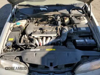 2000 Volvo S70 z VIN YV1LS61J6Y2667537, wystawiony jako Copart lot #81875774 z przebiegiem 224 087 mil mil oraz Tytuł czysty. Historia ofert i sprzedaży dostępna na DreamBid. Obrazek 11.