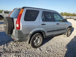 2002 Honda CR-V LX with VIN JHLRD685X2C004107, listed as a Copart auction lot 75190494 with 175,236 mi miles and Clean Title. Bid and sale history available at DreamBid. Image 3.
