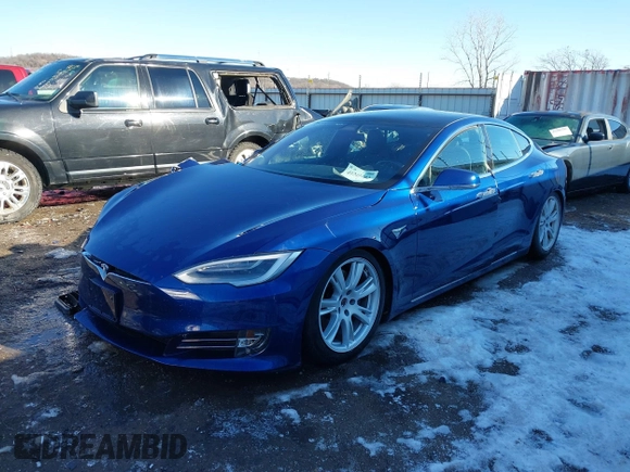 2020 Tesla Model S Long Range with VIN 5YJSA1E26LF410779, listed as a IAAI auction lot 41241192 with 68,764 mi miles and . Bid and sale history available at DreamBid. Image 2.