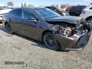2019 Toyota Avalon Limited Hybrid z VIN 4T1B21FBXKU003688, wystawiony jako Copart lot #69697502 z przebiegiem 48 950 mil mil oraz . Historia ofert i sprzedaży dostępna na DreamBid. Obrazek 4.