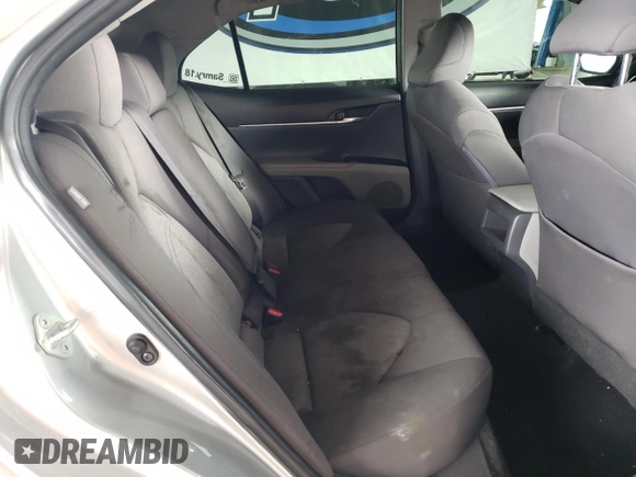 2018 Toyota Camry LE z VIN JTNB11HK8J3025709, wystawiony jako Copart lot #56763315 z przebiegiem 157 941 mil mil oraz Szkoda całkowita • Salvage title. Historia ofert i sprzedaży dostępna na DreamBid. Obrazek 10.