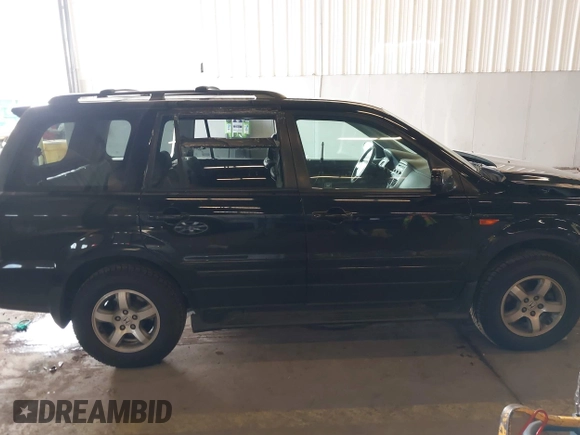 2007 Honda Pilot EX-L with VIN 2HKYF18647H504953, listed as a IAAI auction lot 41750435 with 186,097 mi miles and . Bid and sale history available at DreamBid. Image 13.