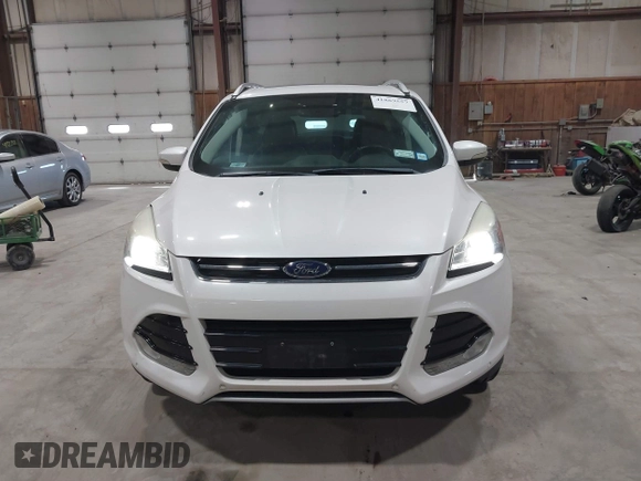 2016 Ford Escape Titanium with VIN 1FMCU9J95GUB02377, listed as a IAAI auction lot 41869557 with 88,441 mi miles. Bid and sale history available at carsss.com. Image 12.