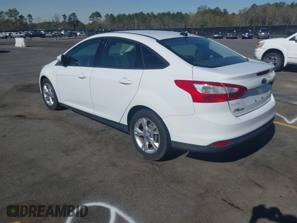 2013 Ford Focus SE with VIN 1FADP3F25DL223541, listed as a IAAI auction lot 41877904 with 192,484 mi miles and . Bid and sale history available at DreamBid. Image 3.