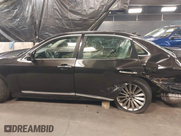 2015 Hyundai Equus Signature z VIN KMHGH4JH7FU100256, wystawiony jako IAAI lot #39882362 z przebiegiem 105 880 mil mil oraz . Historia ofert i sprzedaży dostępna na DreamBid. Obrazek 14.