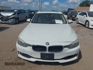 2015 BMW 3 Series 320i xDrive with VIN WBA3C3C58FK201748, listed as a IAAI auction lot 42678404 with 115,043 mi miles and . Bid and sale history available at DreamBid. Image 12.