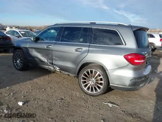 2018 Mercedes-Benz GLS with VIN 4JGDF6EE2JB019660, listed as a IAAI auction lot 41214720 with 80,896 mi miles. Bid and sale history available at carsss.com. Image 3.