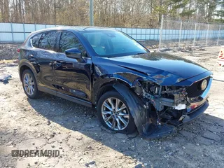 2021 Mazda CX-5 Grand Touring with VIN JM3KFADM5M0428279, listed as a IAAI auction lot 41747175 with 49,579 mi miles. Bid and sale history available at carsss.com. Image 1.