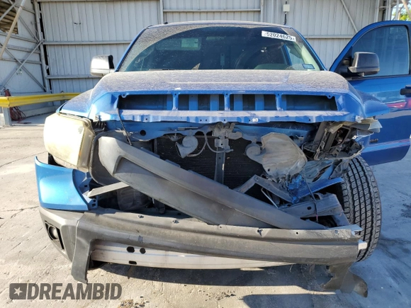 2016 Toyota Tundra SR z VIN 5TFRM5F14GX106798, wystawiony jako Copart lot #52024625 z przebiegiem 194 869 mil mil oraz Szkoda całkowita • Salvage title. Historia ofert i sprzedaży dostępna na DreamBid. Obrazek 13.