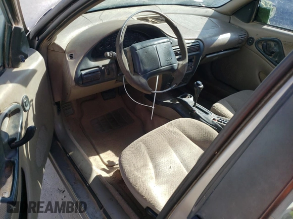 2000 Chevrolet Cavalier LS z VIN 1G1JF5246Y7310844, wystawiony jako Copart lot #70492794 z przebiegiem Nie podano mil oraz Szkoda całkowita • Salvage title. Historia ofert i sprzedaży dostępna na DreamBid. Obrazek 8.
