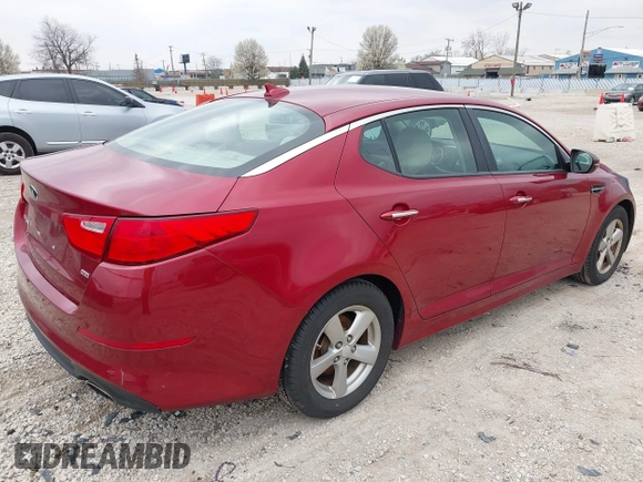 2015 Kia Optima LX with VIN 5XXGM4A72FG357449, listed as a IAAI auction lot 42079075 with 136,042 mi miles. Bid and sale history available at carsss.com. Image 4.