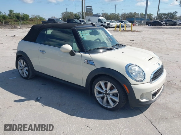 2013 MINI Convertible S with VIN WMWZP3C51DT297843, listed as a IAAI auction lot 41527353 with 127,827 mi miles and . Bid and sale history available at DreamBid. Image 1.
