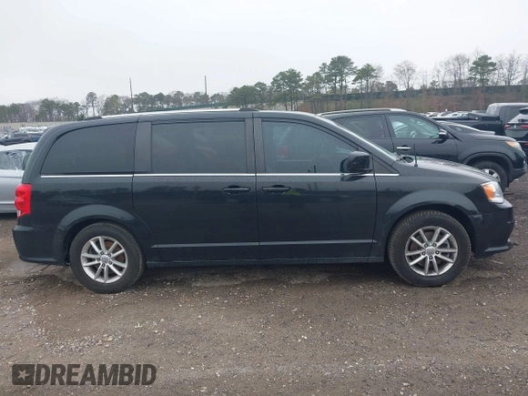 2019 Dodge Grand Caravan SXT with VIN 2C4RDGCG6KR749505, listed as a IAAI auction lot 42087083 with 167,551 mi miles and . Bid and sale history available at DreamBid. Image 13.