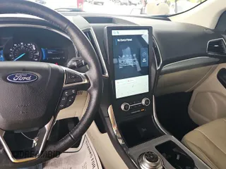 2021 Ford Edge Titanium with VIN 2FMPK3K98MBA53776, listed as a IAAI auction lot 42785493 with 114,856 mi miles and . Bid and sale history available at DreamBid. Image 9.