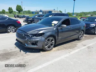 2020 Ford Fusion Titanium with VIN 3FA6P0K96LR173971, listed as a IAAI auction lot 42232469 with 82,474 mi miles and . Bid and sale history available at DreamBid. Image 18.