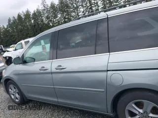 2008 Honda Odyssey Touring with VIN 5FNRL38908B098771, listed as a IAAI auction lot 41878646 with 167,834 mi miles. Bid and sale history available at carsss.com. Image 14.
