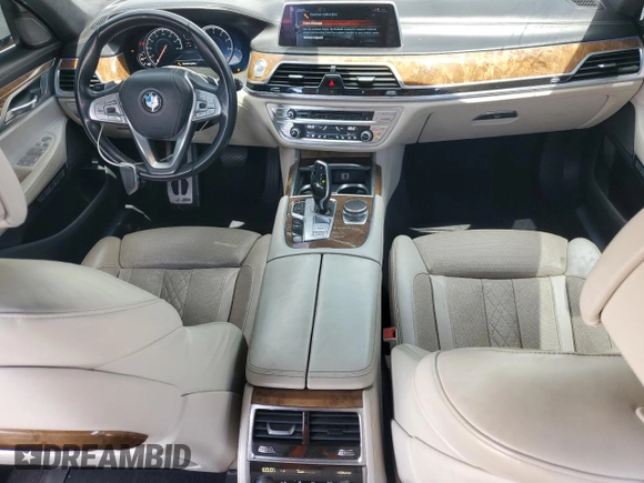 2016 BMW 7 Series 750i z VIN WBA7F0C56GGL99130, wystawiony jako Copart lot #56972905 z przebiegiem 100 556 mil mil oraz Czysty tytuł • Clean title. Historia ofert i sprzedaży dostępna na DreamBid. Obrazek 8.