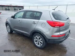 2015 Kia Sportage LX with VIN KNDPB3AC1F7784479, listed as a IAAI auction lot 42124599 with 137,190 mi miles and . Bid and sale history available at carsss.com. Image 3.