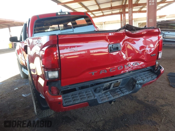 2018 Toyota Tacoma SR with VIN 3TMCZ5AN8JM141486, listed as a IAAI auction lot 42142145 with 54,851 mi miles and . Bid and sale history available at DreamBid. Image 3.
